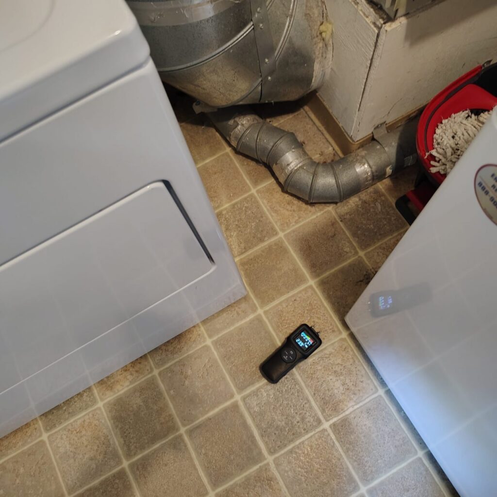 Project documentation of laundry room flooring removed after water damage