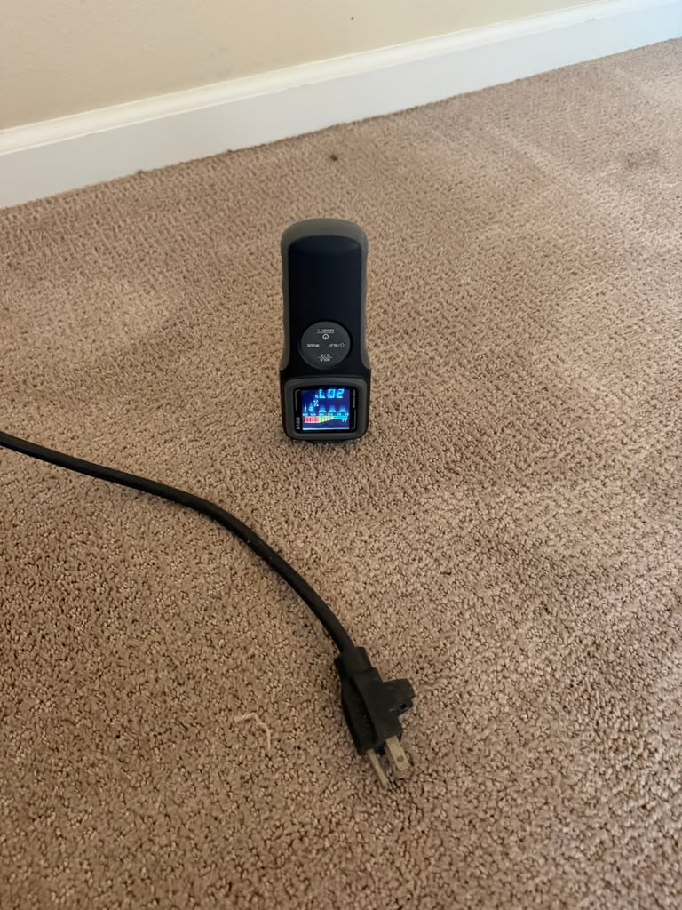 Wet carpet section prior to water damage restoration work in San Jose home