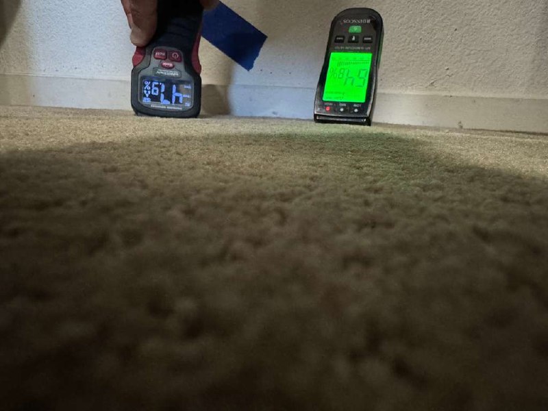 Containment barrier set up in an upstairs hallway during water damage restoration work
