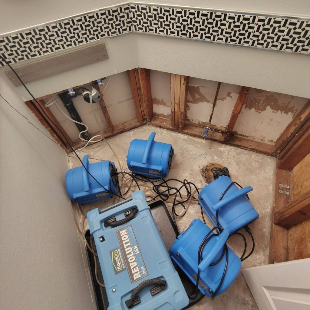 Project documentation showing bathroom area affected by pipe leak in Cupertino home